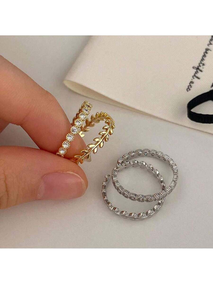 Conjunto de Anéis Femininos em Prata e Ouro com Design de Folhas e Zircônias
