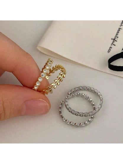 Conjunto de Anéis Femininos em Prata e Ouro com Design de Folhas e Zircônias